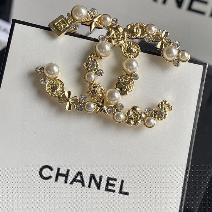 Ch*el brooches